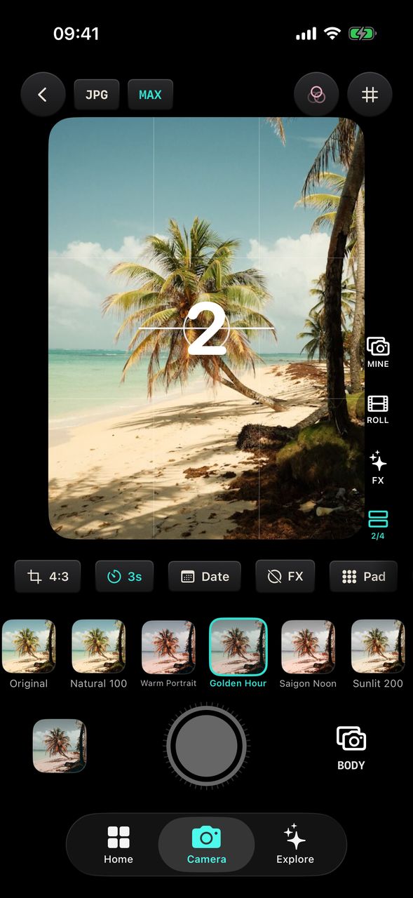 The Filmode camera during a booth run, with a large countdown number on the preview and the BOOTH button showing 2/4.
